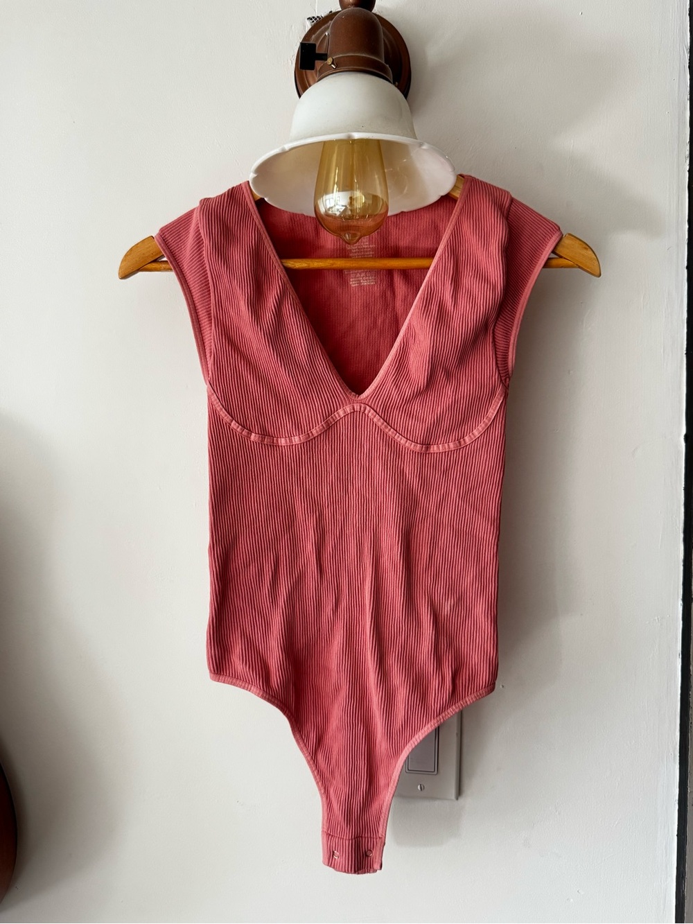 Woman’s Ribbed Pink One-Piece Bodysuit